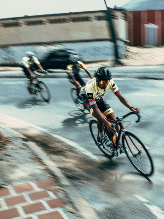 Tour de France cyclists racing through the French countryside at high speed
