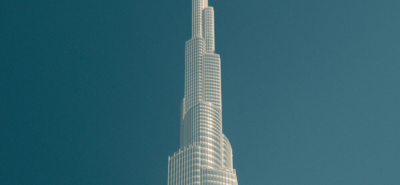 Private jet to Dubai routes map showing popular connections from London, New York, Singapore, and other major cities